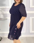 Elegant half-sleeve dress with polka dot print