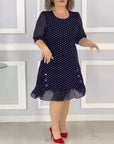 Elegant half-sleeve dress with polka dot print