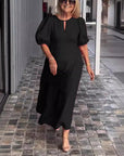 Elegant Dress with Statement Puff Sleeves