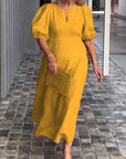 Elegant Dress with Statement Puff Sleeves