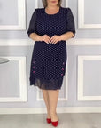Elegant half-sleeve dress with polka dot print