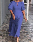 Elegant Dress with Statement Puff Sleeves